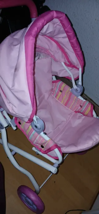 Carrito de muñecas rosa