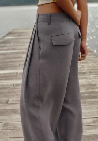 Pantalón Zara doble pliegue gris