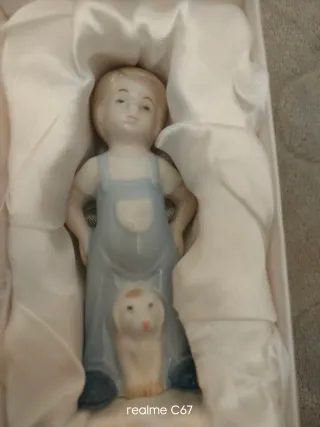 Figurina bambina con cane in ceramica vendo tutto