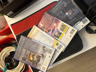 Console PS2 nera con giochi e accessori