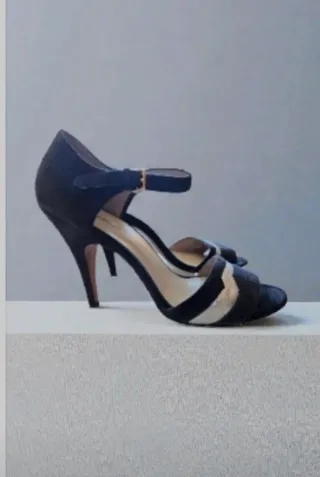 Sandalias Bimba y Lola fiesta negras y doradas