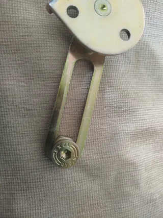 Articulación para maneta corredera