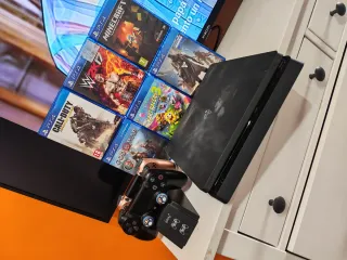 PS4 Slim Negra + 2 Mandos y 6 Juegos