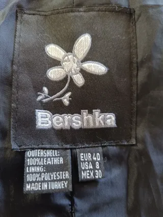 Chaqueta larga de piel negra