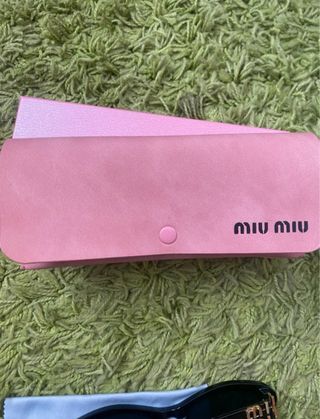 Occhiali da sole Miu Miu neri e rosa