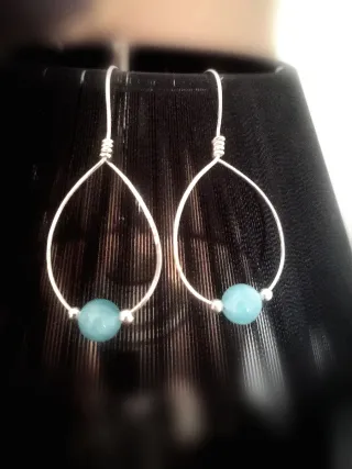 Pendientes ovalados con perla azul