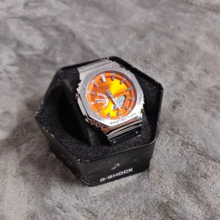 Reloj Casio de acero con dial naranja