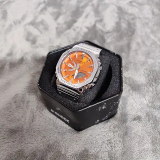 Reloj Casio de acero con dial naranja