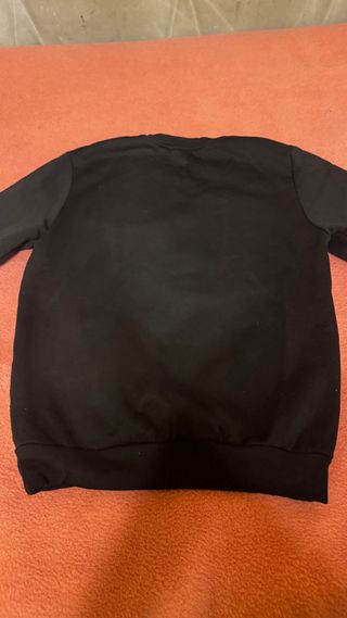 Sudadera Donald con pistola y gorra