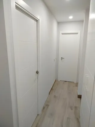 Instalación de Tarima, Rodapié y Puertas.