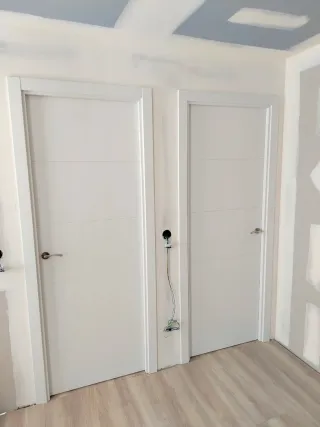 Instalación de Tarima, Rodapié y Puertas.