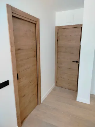 Instalación de Tarima, Rodapié y Puertas.