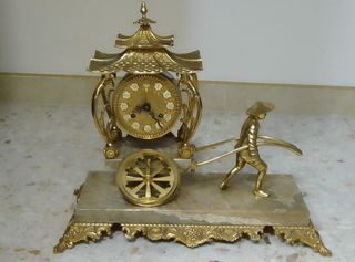 Reloj de sobremesa de bronce