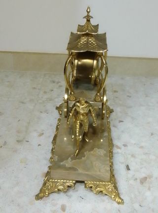 Reloj de sobremesa de bronce