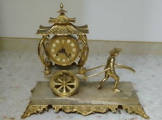 Reloj de sobremesa de bronce