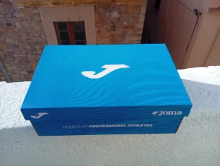 Zapatillas de fútbol Joma negras y verdes