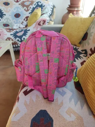 Mochila pequeña rosa con estampado