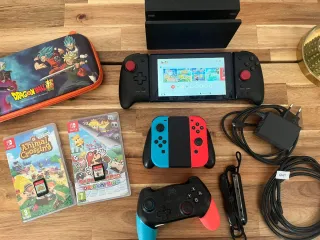 Pacchetto Nintendo Switch + Giochi + Accessori