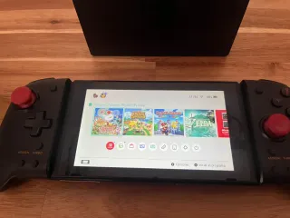 Pacchetto Nintendo Switch + Giochi + Accessori