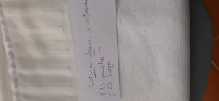 Cortina blanca sin estrenar