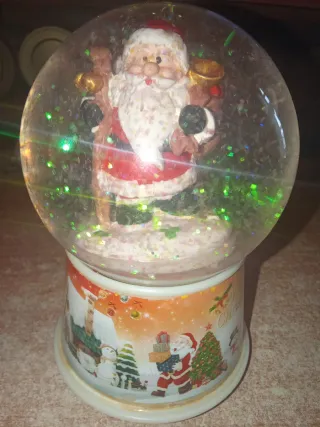 Bola de Navidad con música y Santa Claus girando