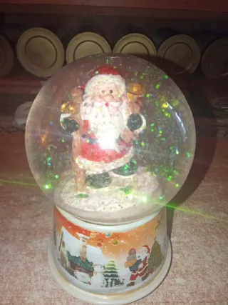 Bola de Navidad con música y Santa Claus girando