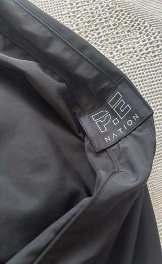 P.E Nation Cortavientos Negro