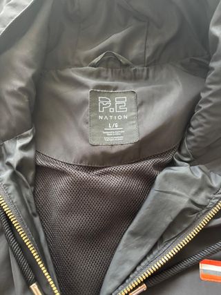 P.E Nation Cortavientos Negro