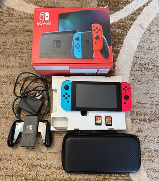 Nintendo Switch + 2 giochi + accessori