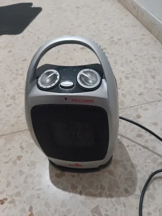 Calefactor portátil con asa