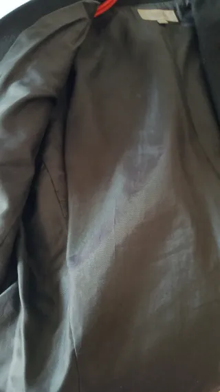 Americana negra con hilo metalizado