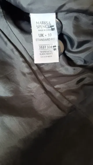 Americana negra con hilo metalizado