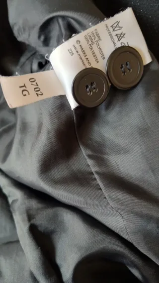 Americana negra con hilo metalizado