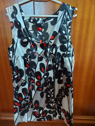 Blusa sin mangas con cremallera