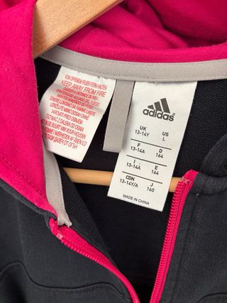 Chaqueta Adidas negra con rayas rosas