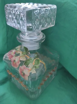 Bottiglia in vetro decorata floreale