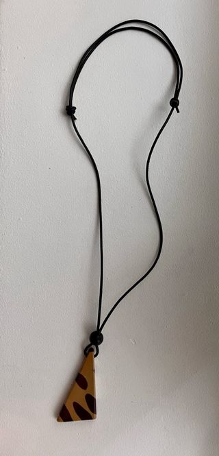 Set di 5 collane con semi e piume