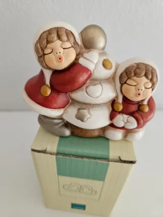 Bimbe natalizie Thun con albero