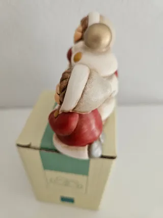 Bimbe natalizie Thun con albero