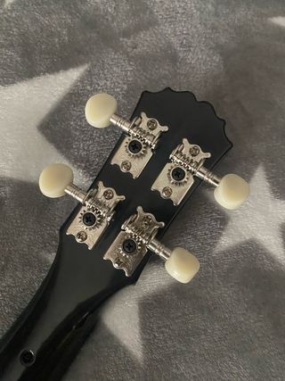 Ukelele Korala a cuadros con smiley