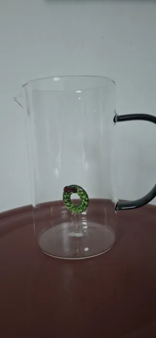 Brocca natalizia in vetro verde