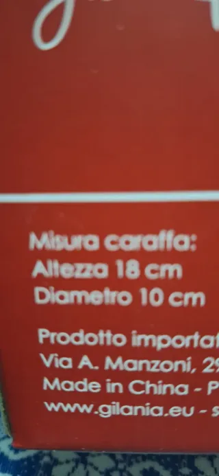 Brocca natalizia in vetro verde