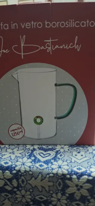 Brocca natalizia in vetro verde