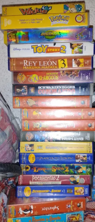 Lote de 30 películas VHS + reproductor de DVD