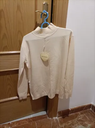 Jersey de mujer cuello alto beige