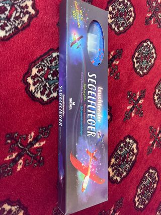 Avión de juguete con luces LED