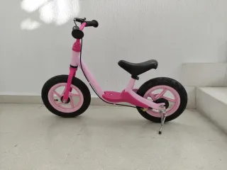 Bicicleta (como nueva) de equilibrio infantil rosa