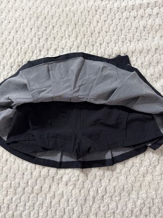 Falda vaquera corta plisada