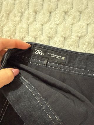 Falda vaquera corta plisada