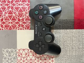 PS3 Super slim + 2 mandos + 2 juegos